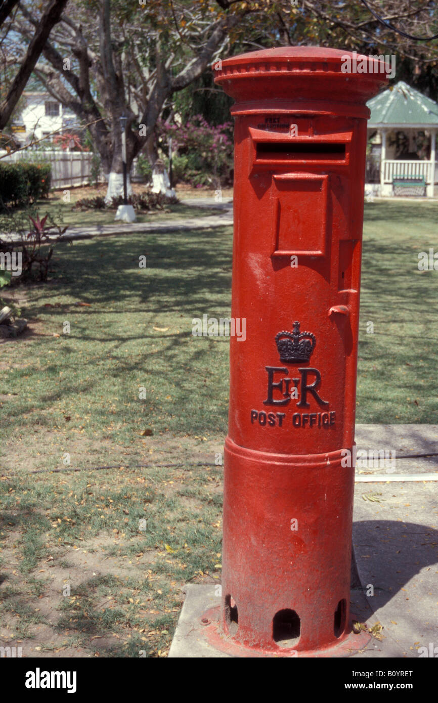 Old fashioned English red pillar box with EIIR Royal Cypher outside Government House in Belize City, Belize, Central America Stock Photo