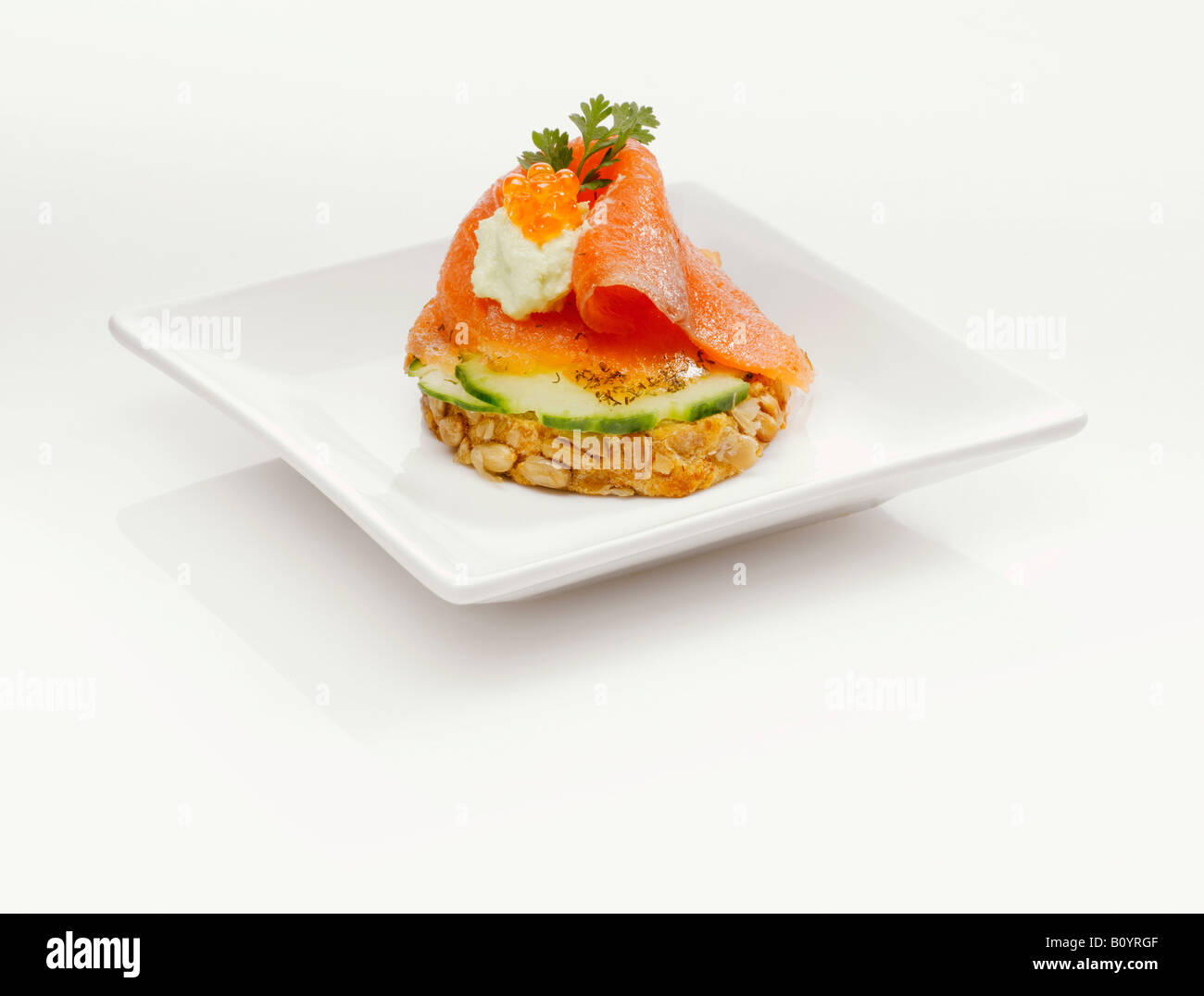 Sandwich with salmon and cucumber slices Stock Photo
