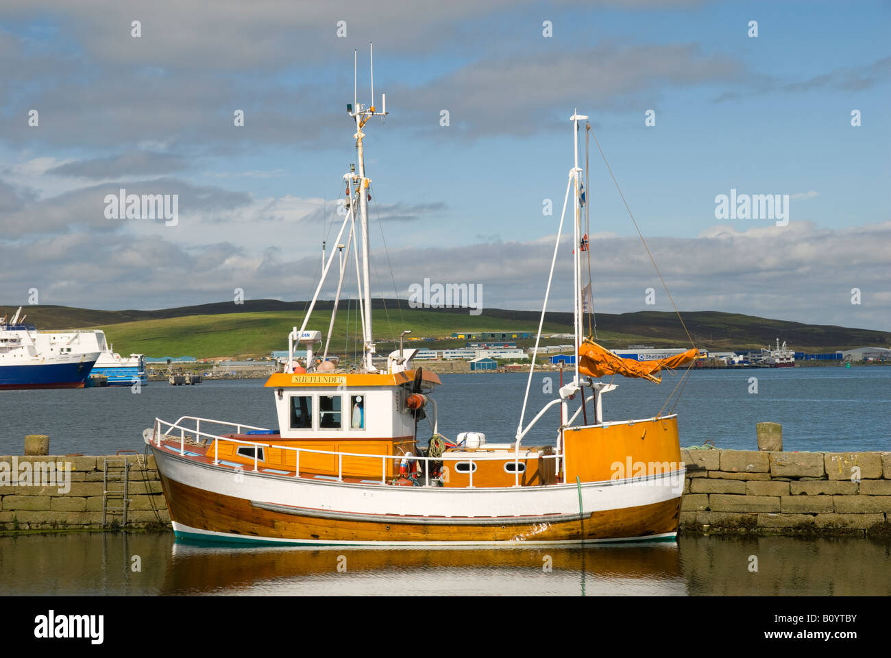 Fishing boat moored outside the Shetland Museum and Archives, Hay's Dock, Lerwick, Shetland