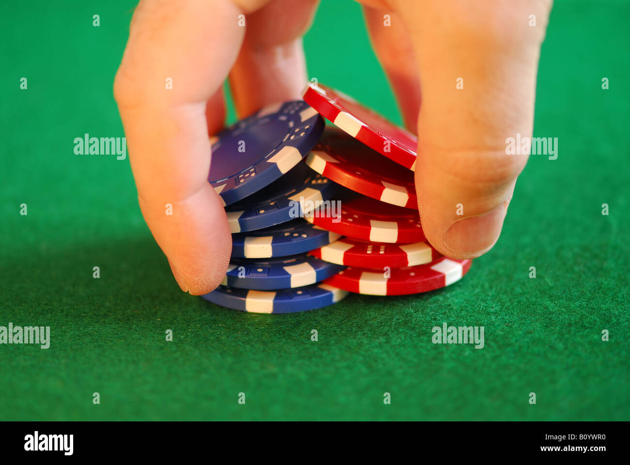 Close up on man s hand doing a pocker chip trick shuffle Stock Photo - Alamy