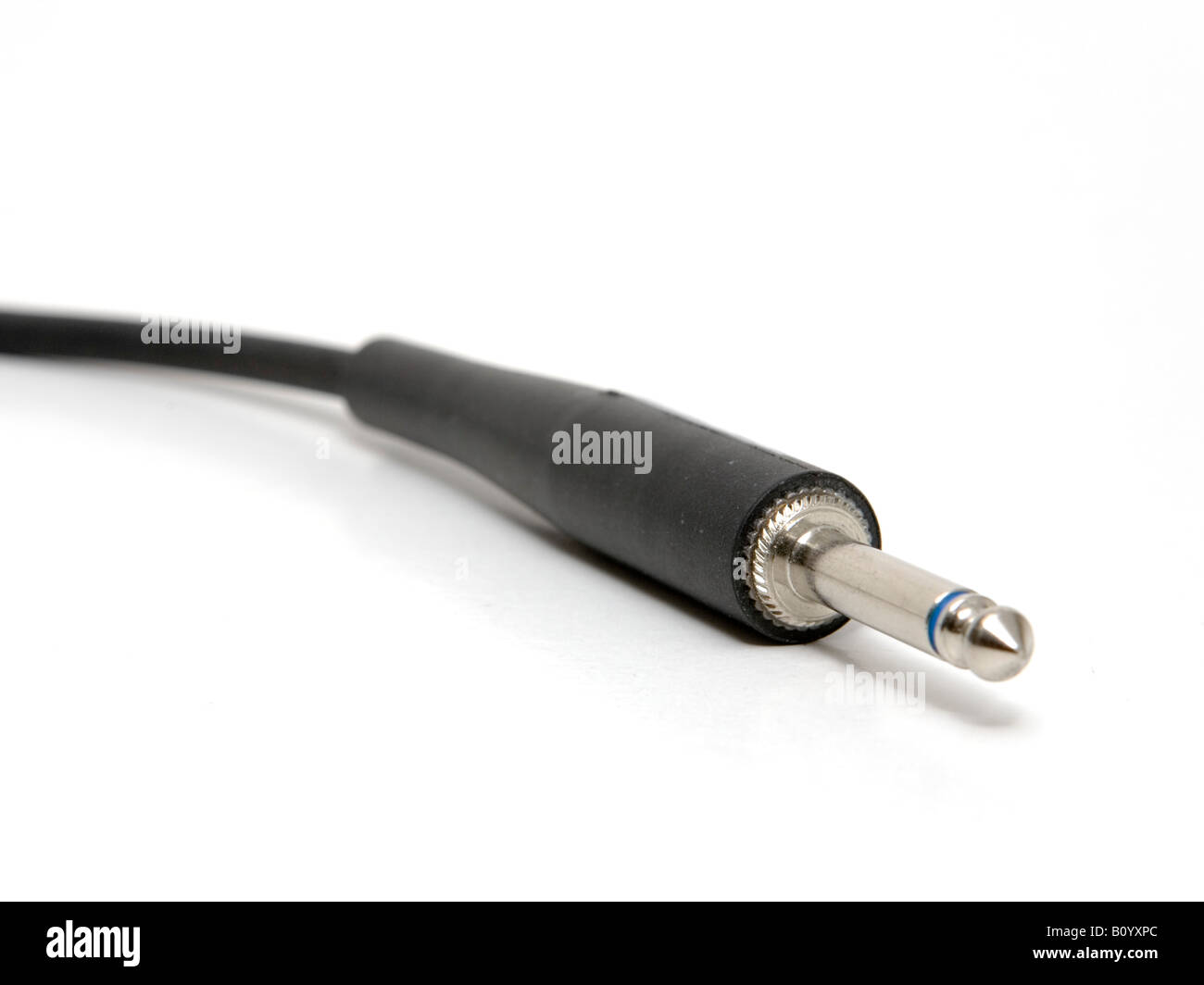 Guitar cable plug over white Stock Photo Alamy