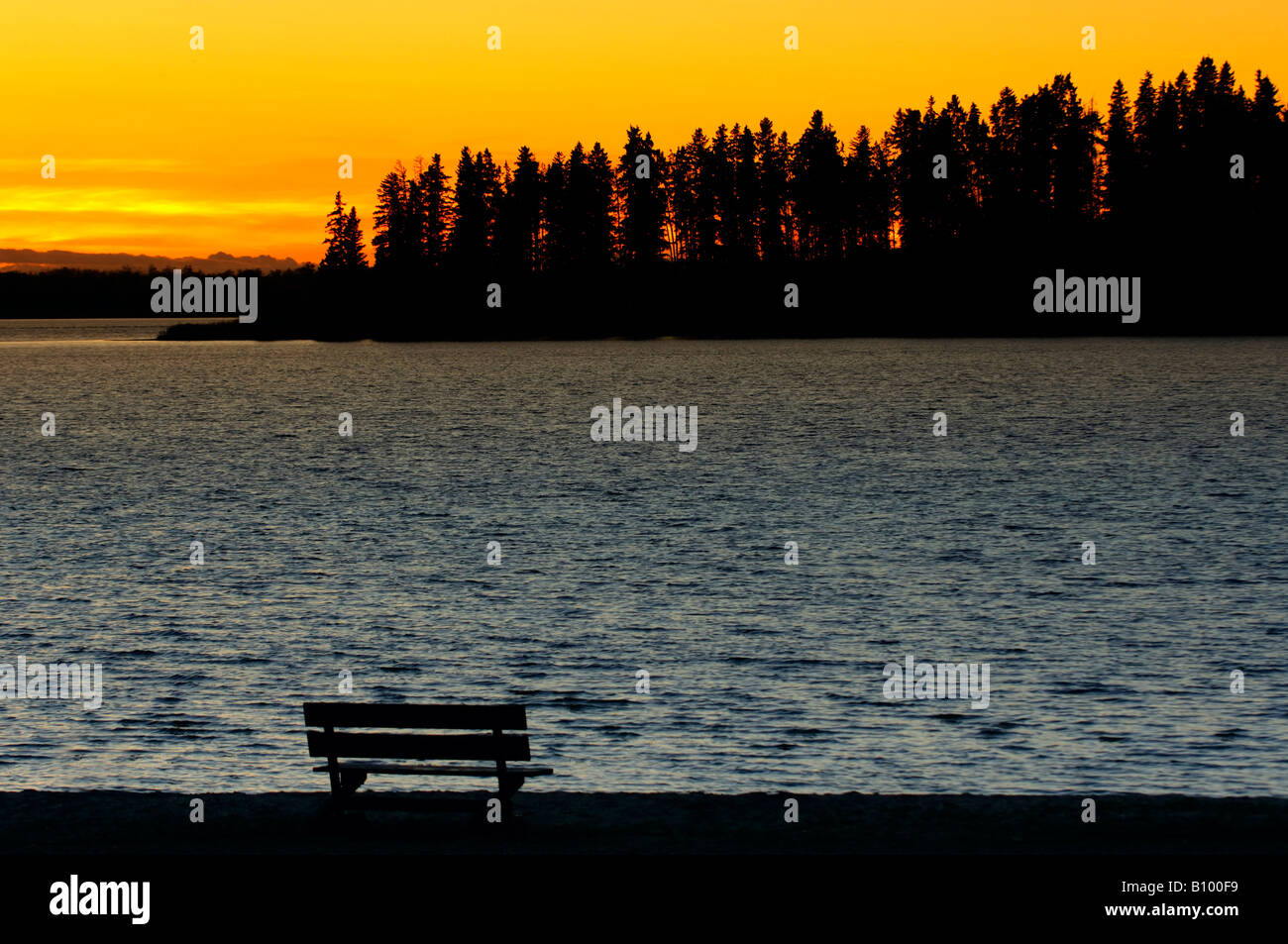 Sunset and bench Stock Photo - Alamy