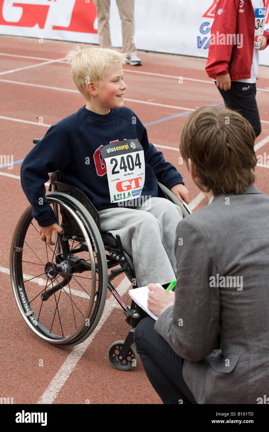 Disabled athlete boy in a wheelchair 10 year old Stock Photo