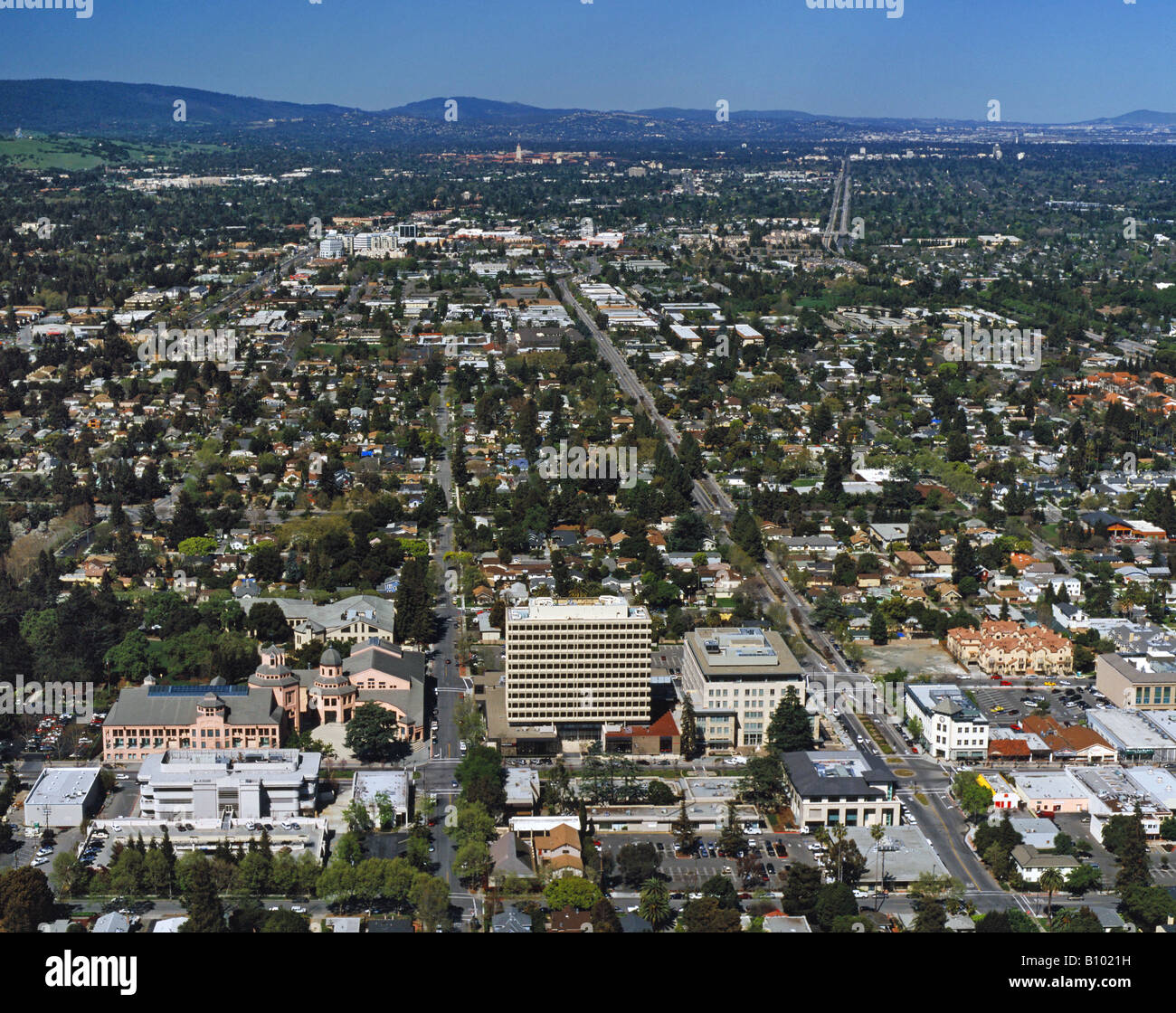 aerial above Castro Street Mountain View, California with Stanford University in the background Stock Photo