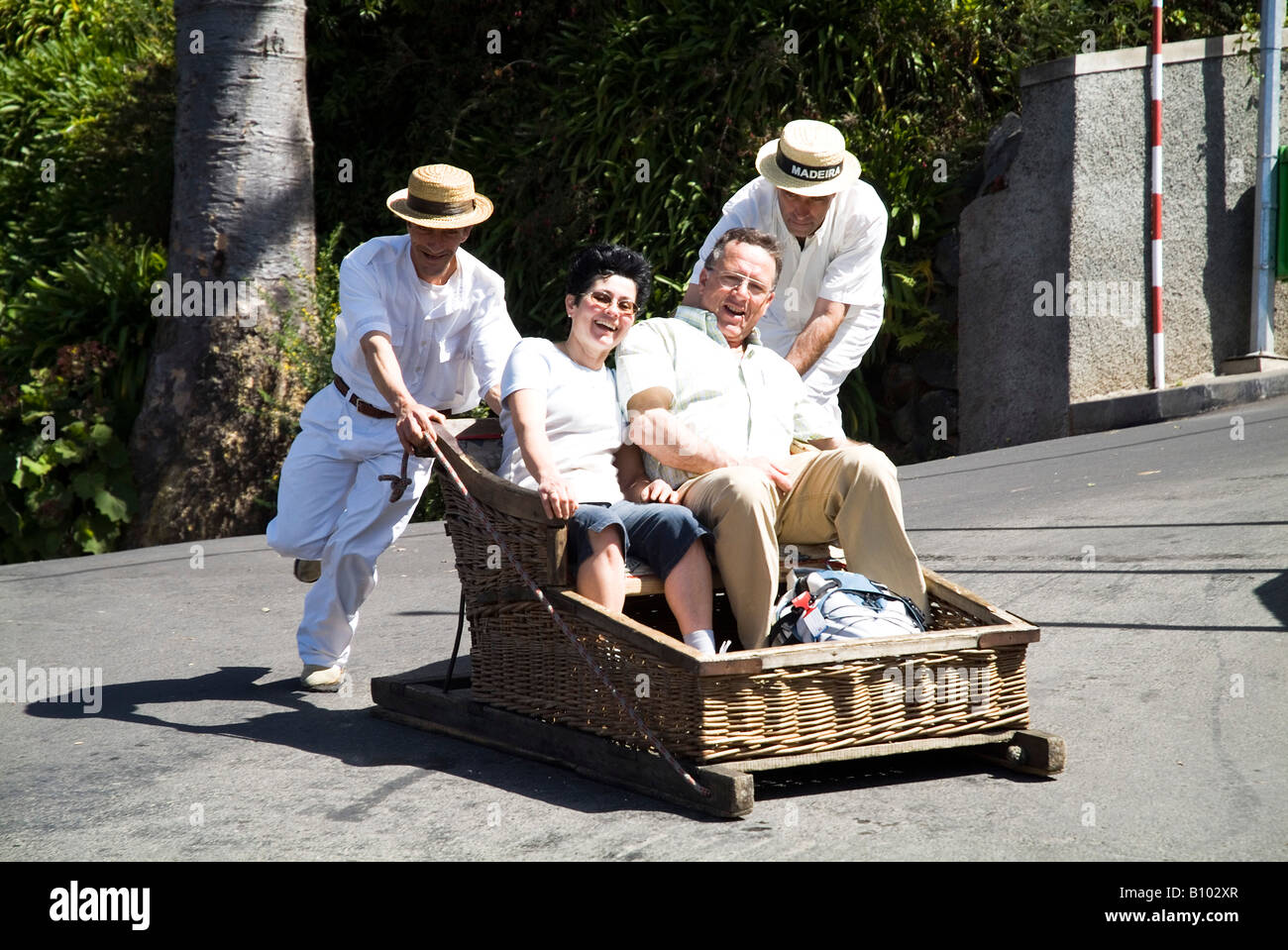 dh wicker basket toboggan MONTE FUNCHAL MADEIRA PORTUGAL Tourist couple