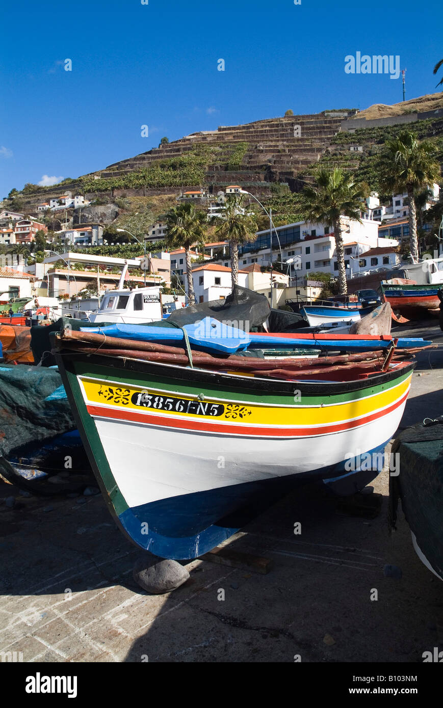 dh  CAMARA DE LOBOS MADEIRA Colourful fishing boats beached on slipway local boat harbour Stock Photo