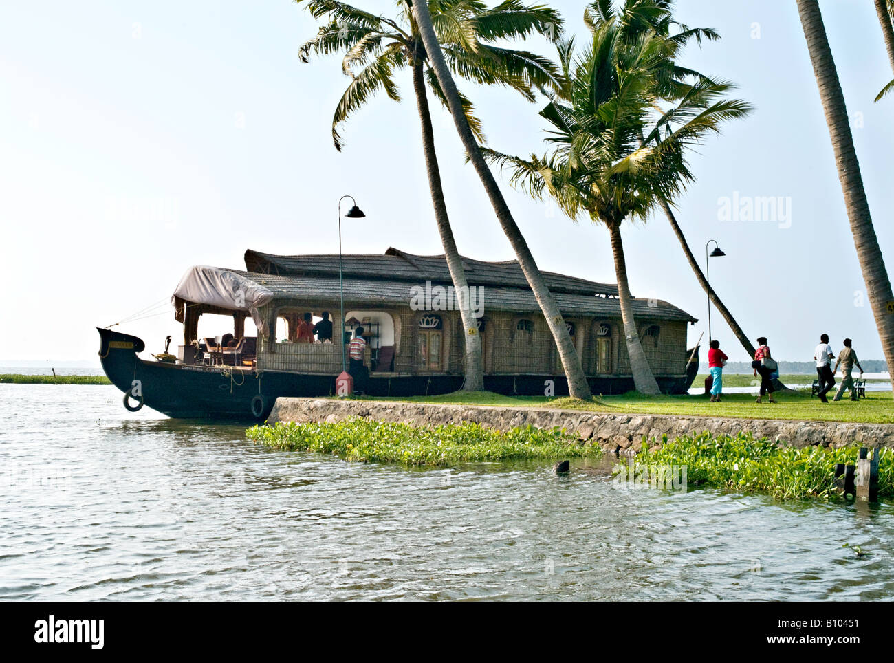 INDIA KERALA Renovated rice boat at a resort on Vembanad Lake in the backwaters of Kerala Stock Photo