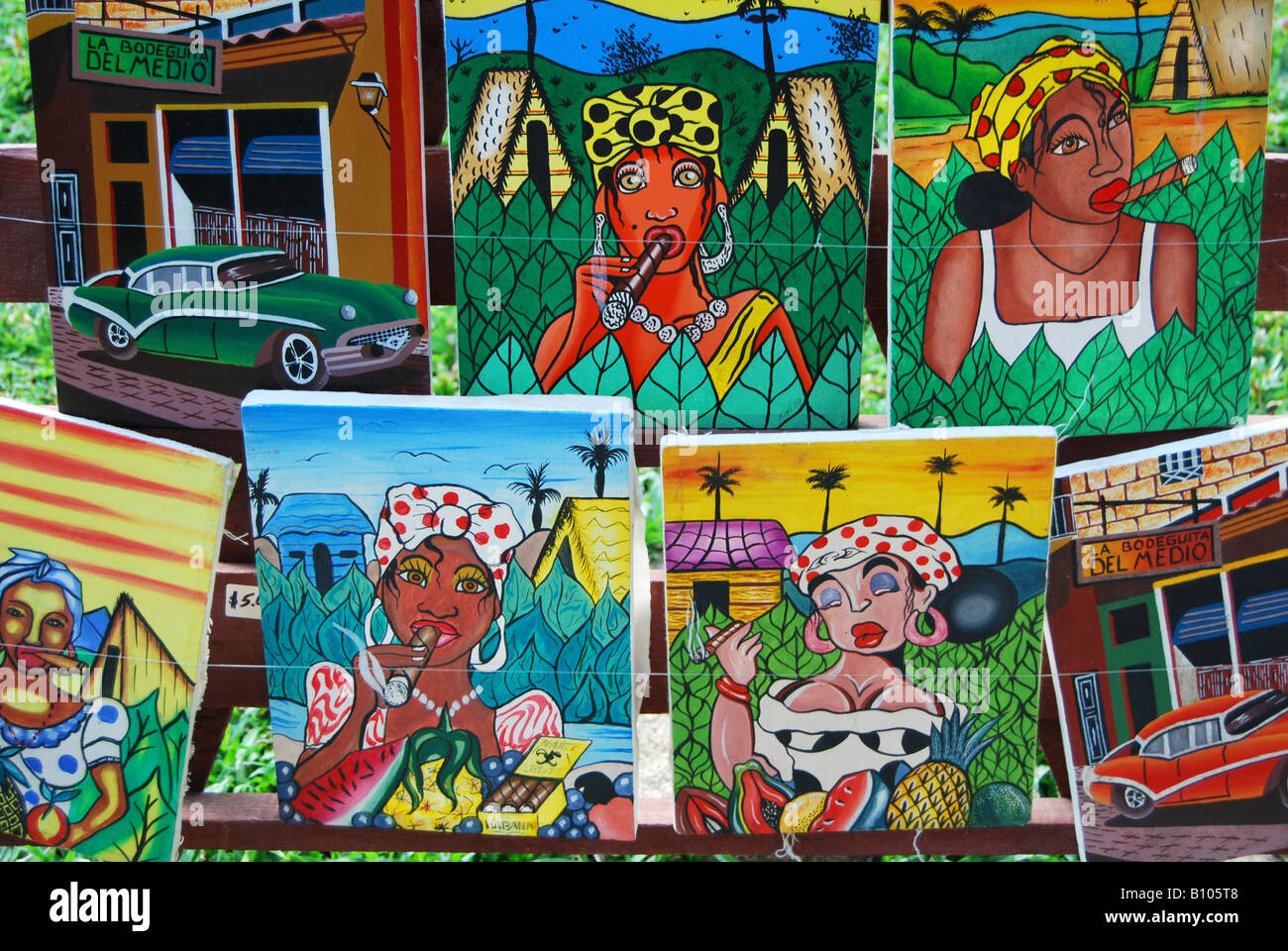 Paintings for sale at a souvenir stall by the Cueva del Indio Indian cave not far from Vinales Stock Photo