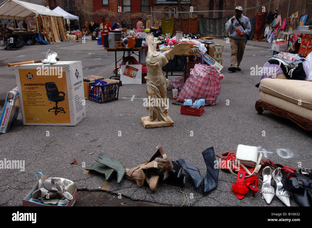 Second hand merchandise for sale at a flea market in the New York neighborhood of Chelsea Stock Photo