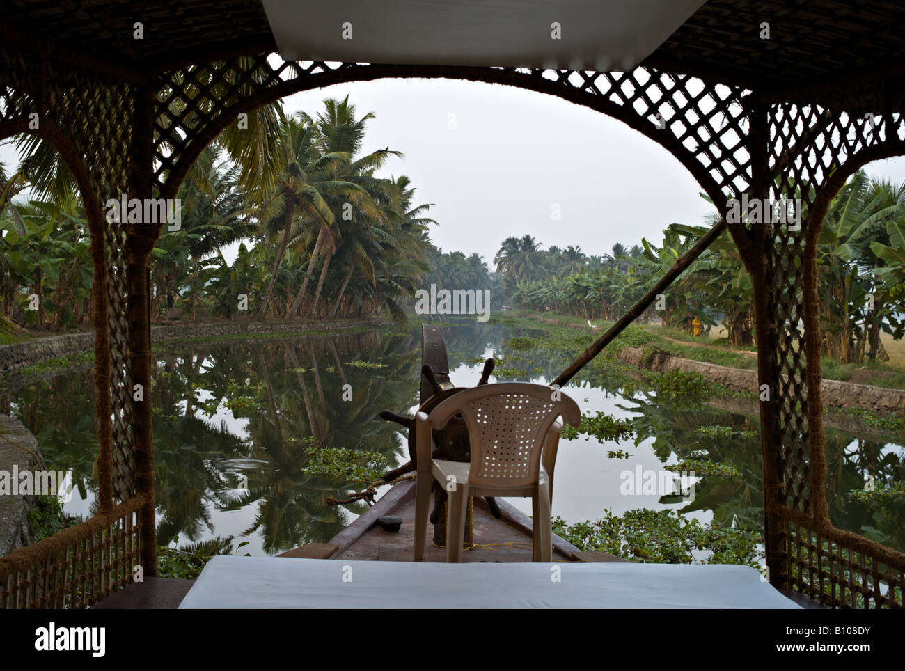 INDIA KERALA View from inside a renovated rice boat of a canal in the backwaters of Kerala near Alleppey Stock Photo
