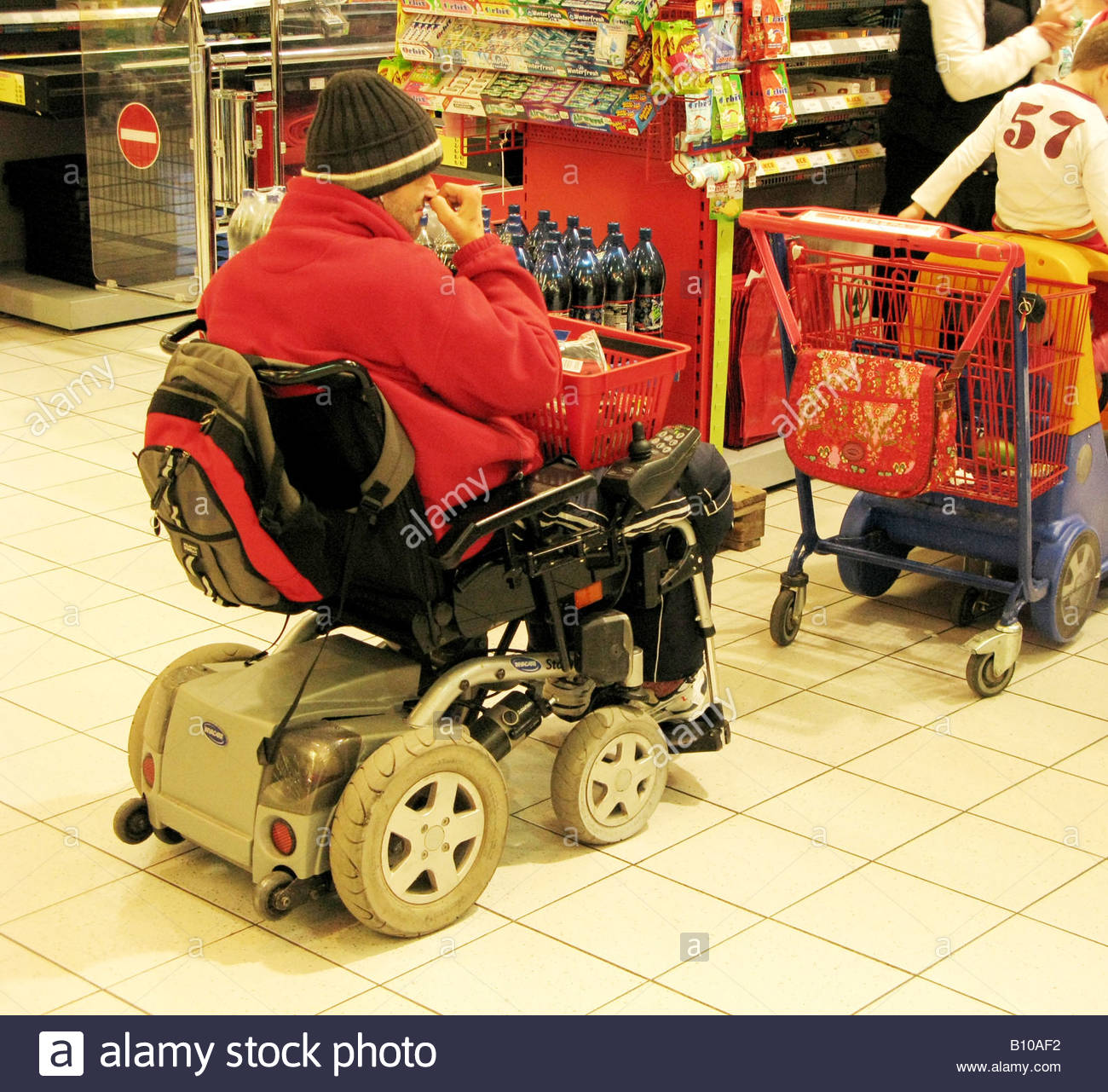 Disabled Wheelchair Shops Shopping Stock Photos & Disabled Wheelchair Shops Shopping Stock