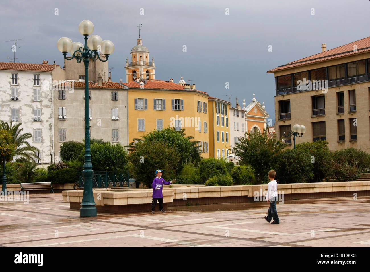 kids playing soccer on Place De Gaulle in Ajaccio Corsica France Stock Photo