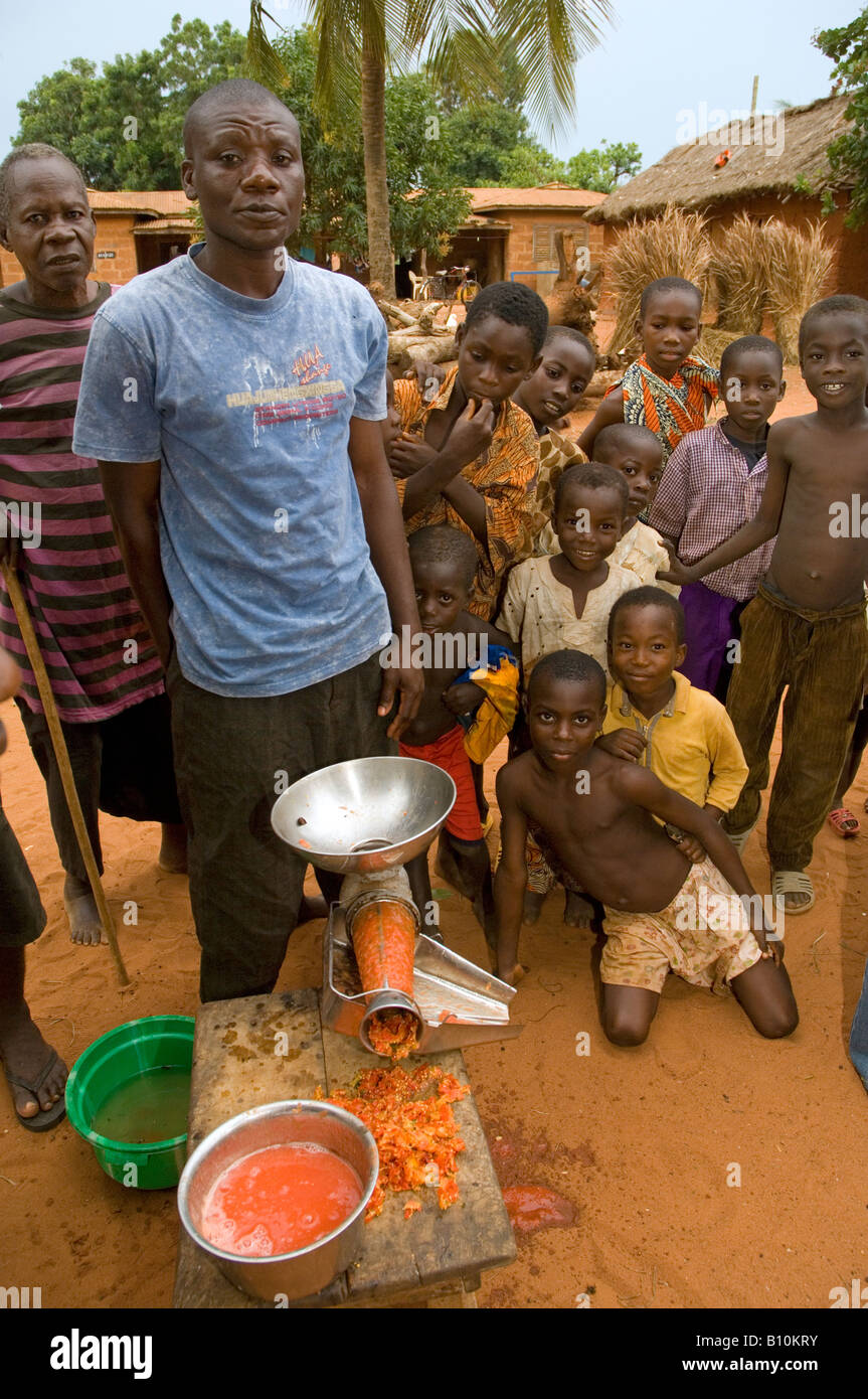 Processing tomatoes locally farmers try to reduce the high post harvest losses, Kuluedor, Ghana Stock Photo