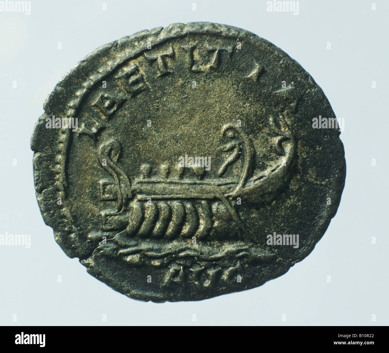Roman coin of galley on antoninanus of Postumus Stock Photo