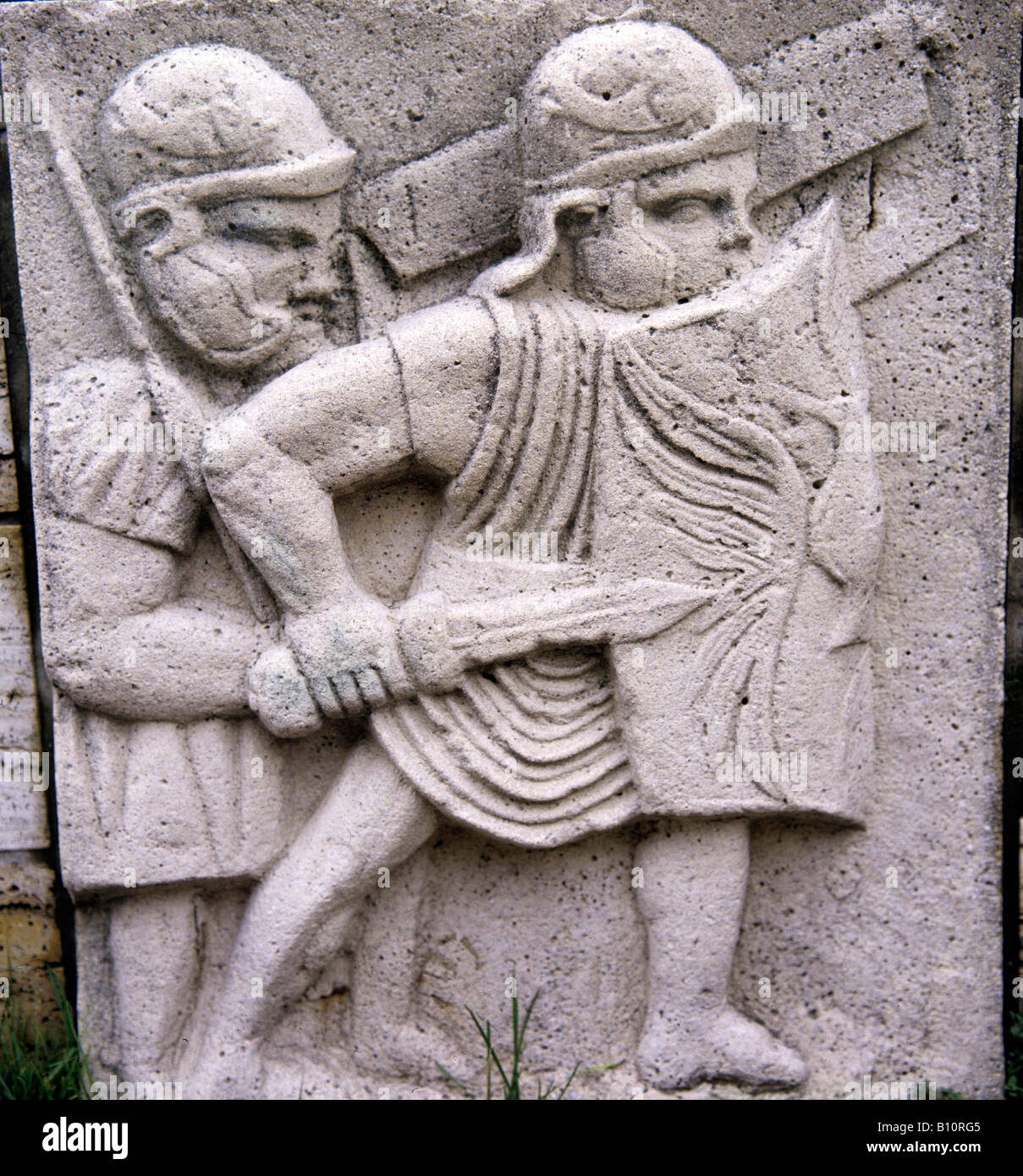 Roman legionaries with shields helmets and dagger. 1st century AD. Germano Roman Stock Photo