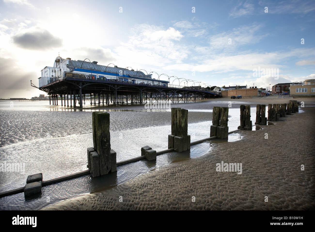 The pier and wooden groynes Cleathorpes beach north Lincolnshire Stock Photo