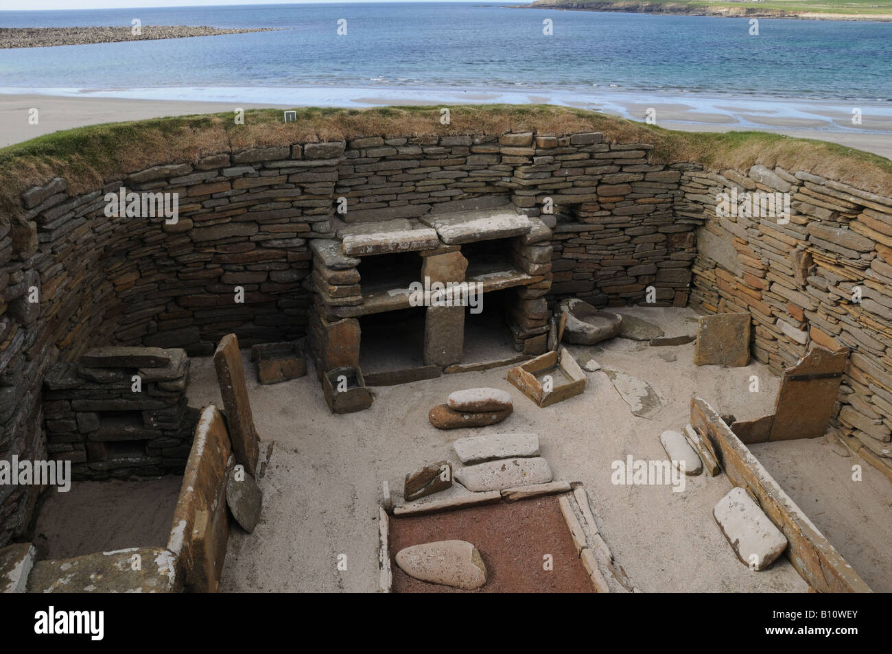 Skara Brae on Orkney Island in Scotland is a Neolithic settlement by the Bay of Skaill. Stock Photo