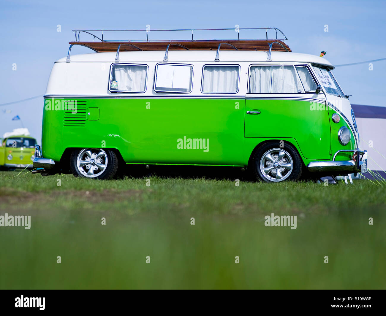 green vw volkswagen split screen camper van bus lowered modified Stock Photo