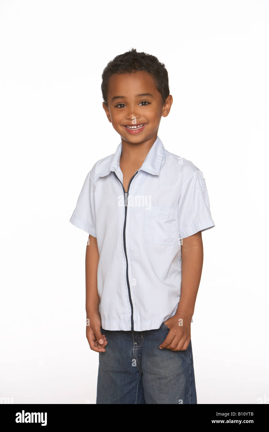 A young boy smiles against a white background Stock Photo - Alamy