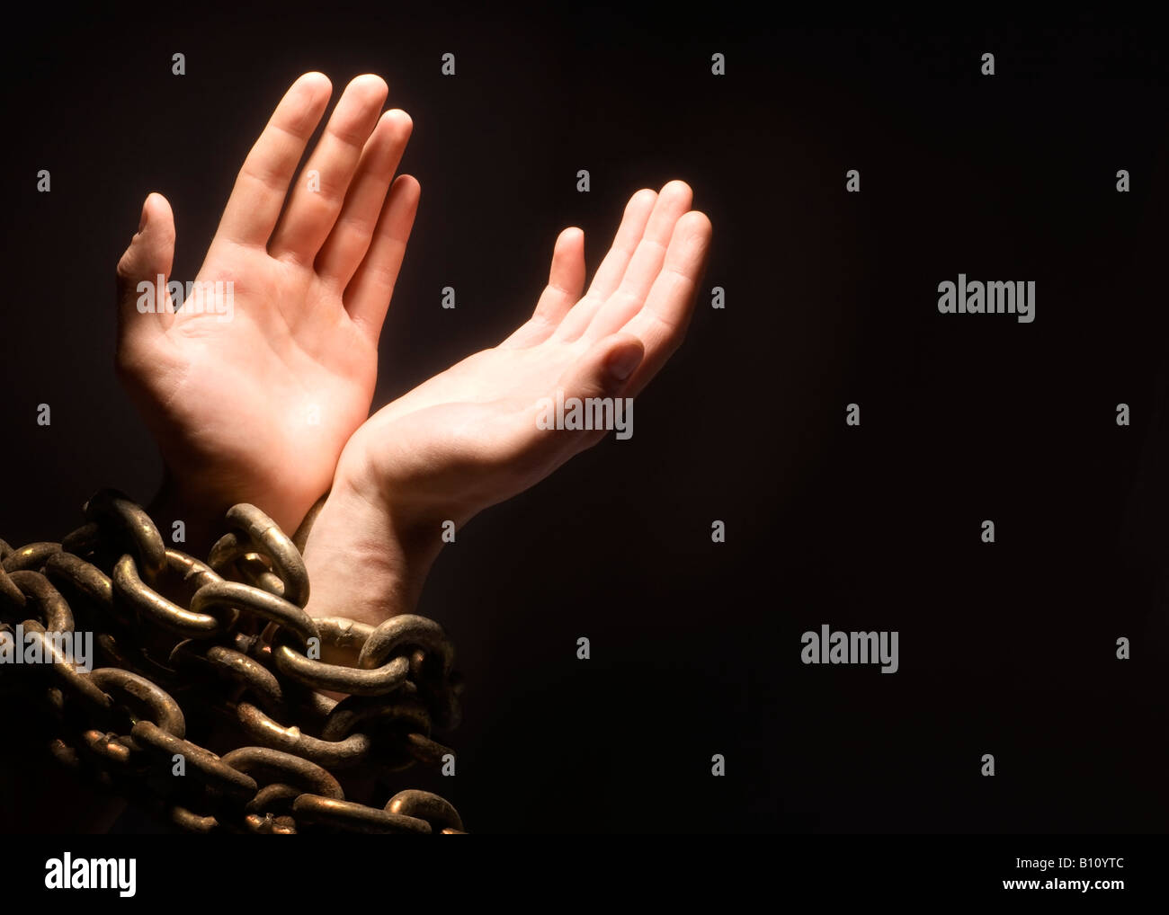 Worshipping with chains Stock Photo Alamy