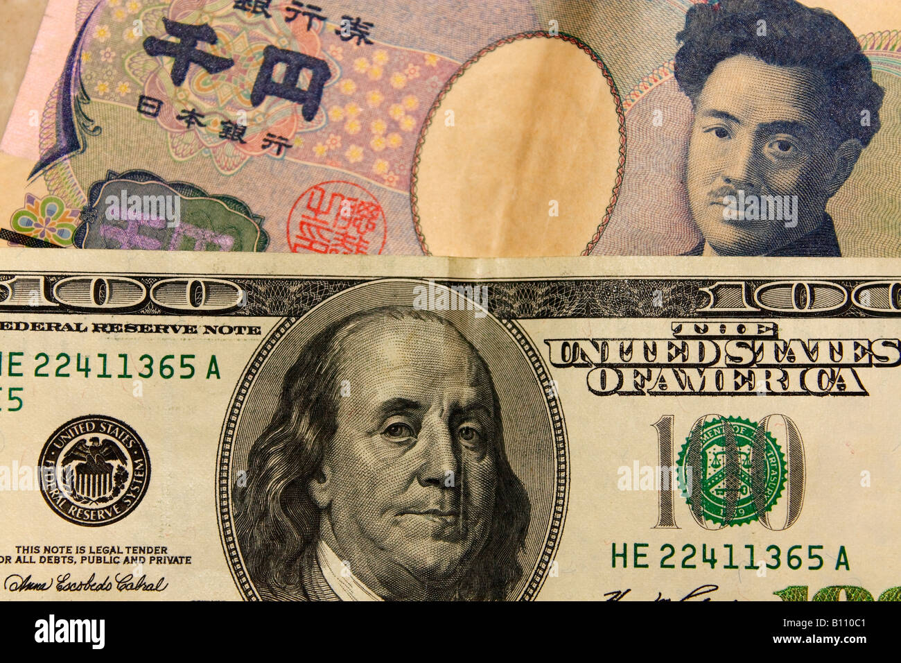 Japanese Yen and USD (American Dollar, United States Dollar) banknote money close up. Stock Photo