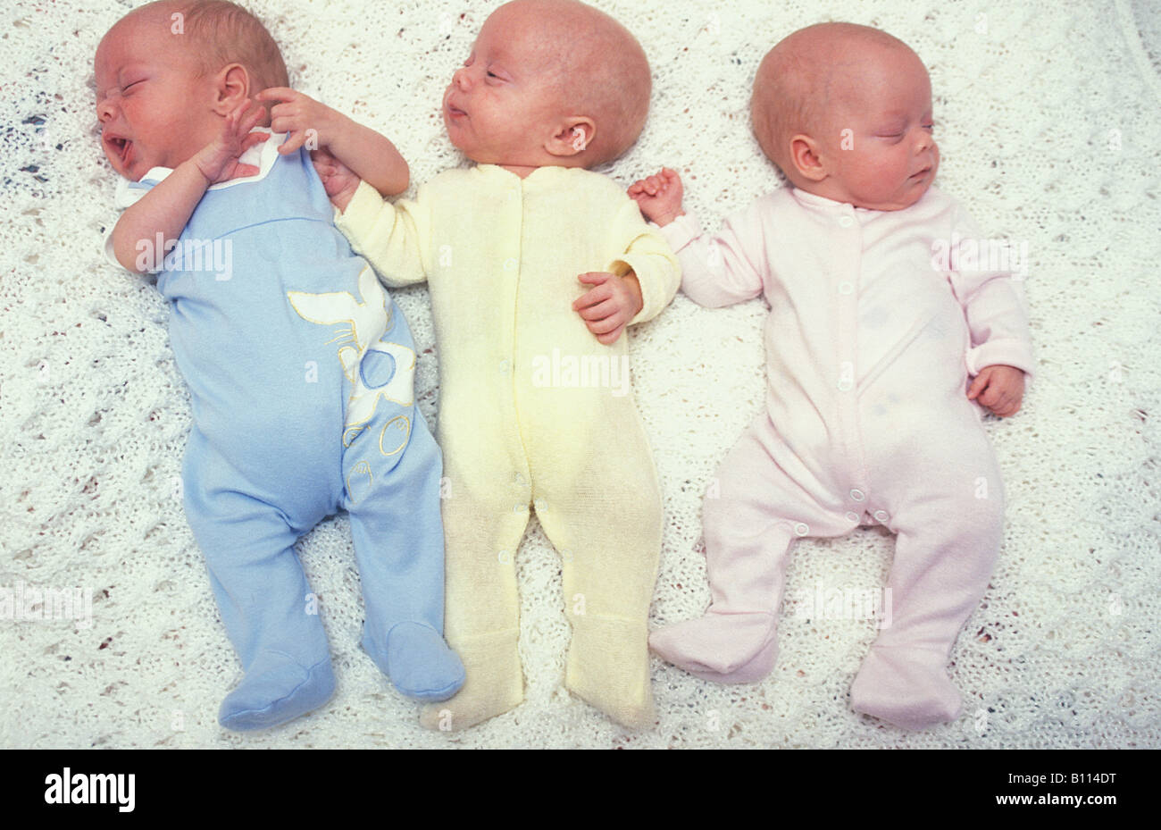 Newborn Triplets Stock Photo Alamy