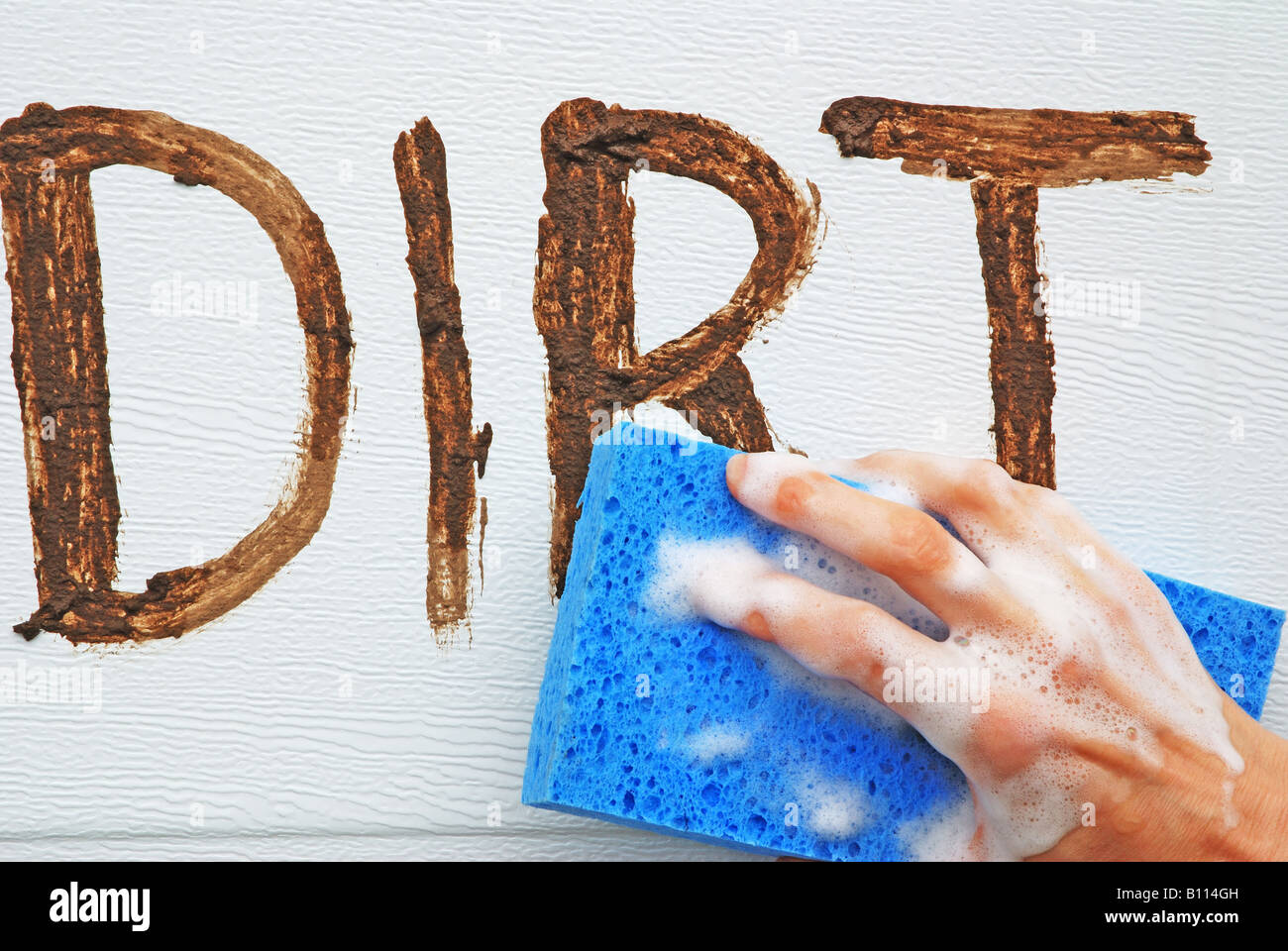 Washing dirt off a wall Stock Photo Alamy