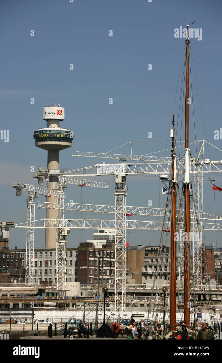 City of Liverpool, England. Building works and cranes near Liverpool’s waterfront, with the Radio City Tower in the background. Stock Photo