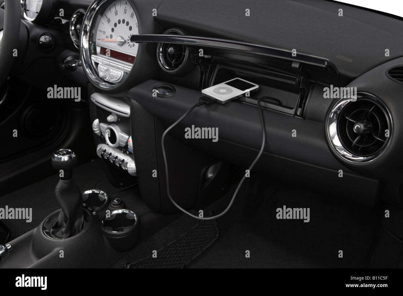 2008 Mini Cooper Clubman in White Auxiliary Jack Props Stock Photo