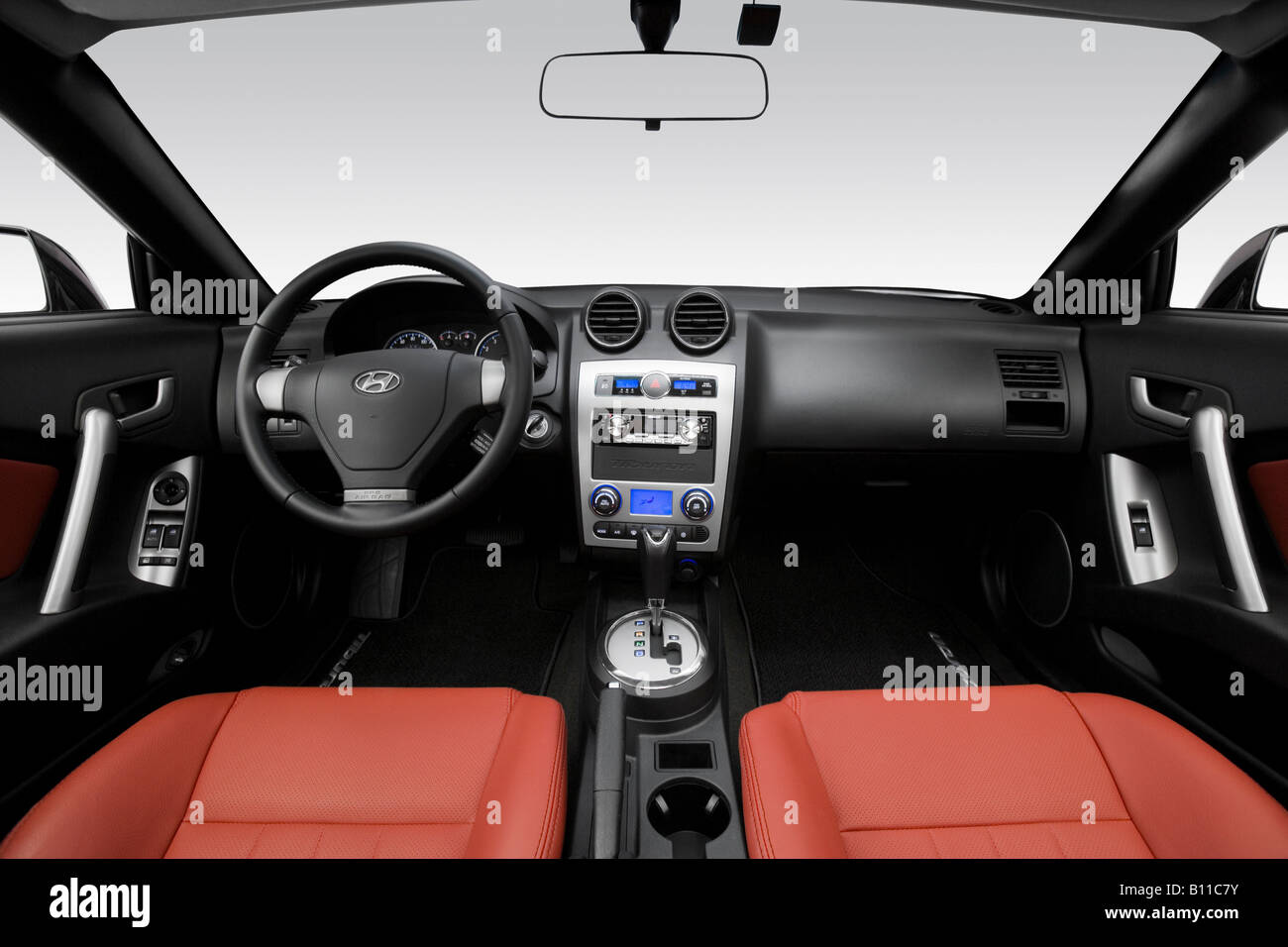 2008 Hyundai Tiburon GT Limited in Black - Dashboard, center console, gear shifter view Stock Photo