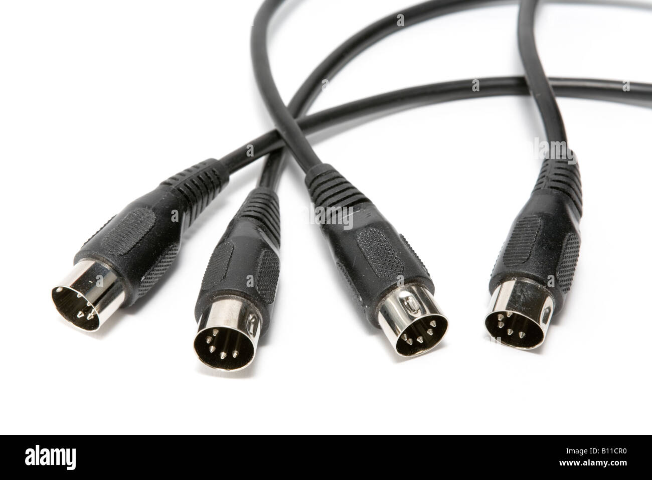 MIDI (Musical Instrument Digital Interface) cables on a white