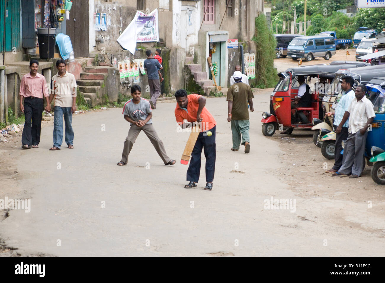 Street cricket in a village in Sri Lanka Stock Photo
