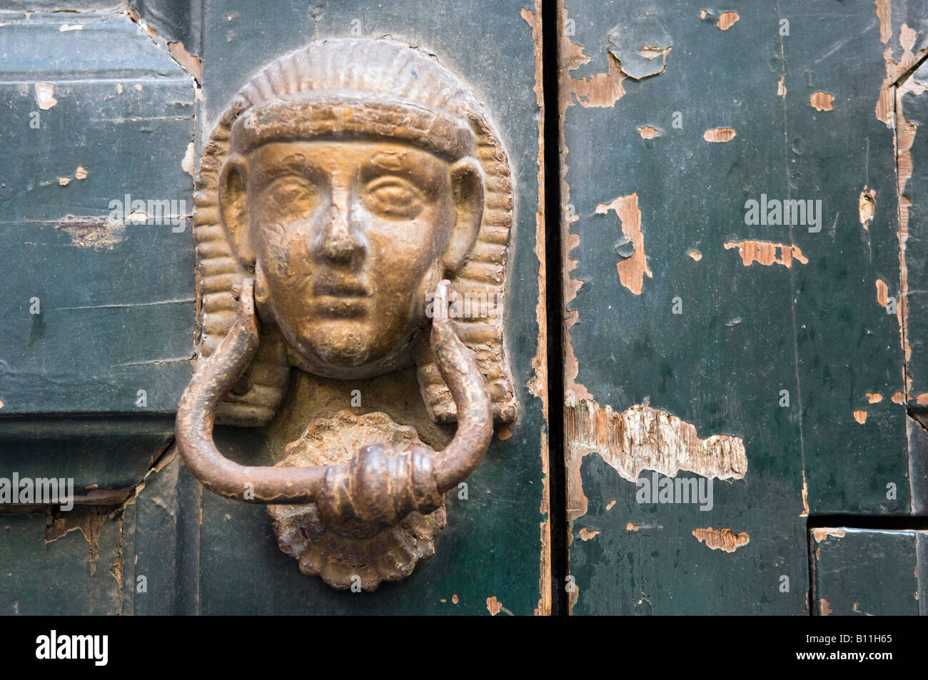 Close up of an Egyptian Head Door Knocker, Naples, Italy Stock Photo