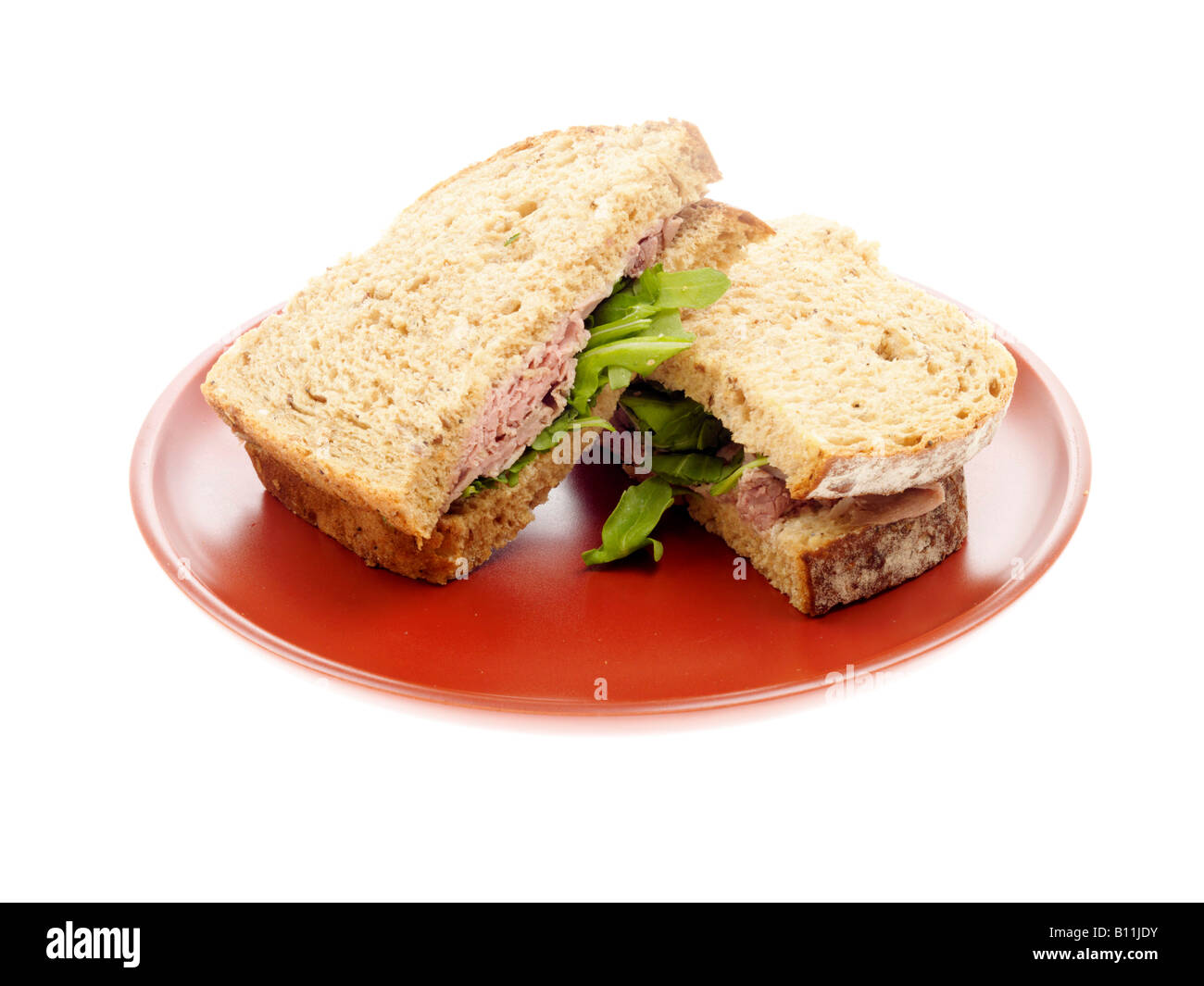 Fresh Cold Rare Roast Beef And Horseradish Mayonnaise Sandwich Isolated Against A White