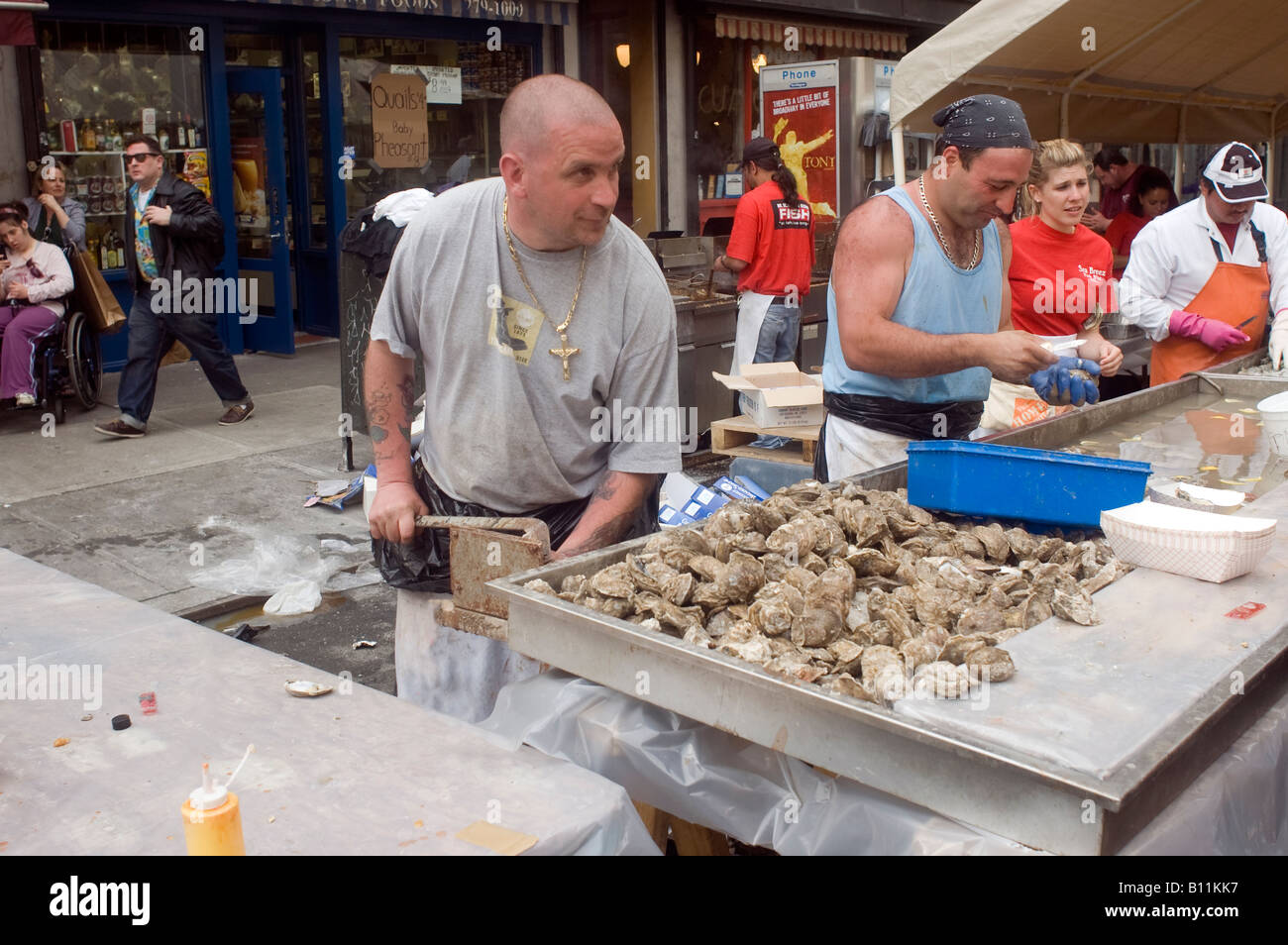 Oyster shucking at the famous Ninth Avenue Food Festival in New York