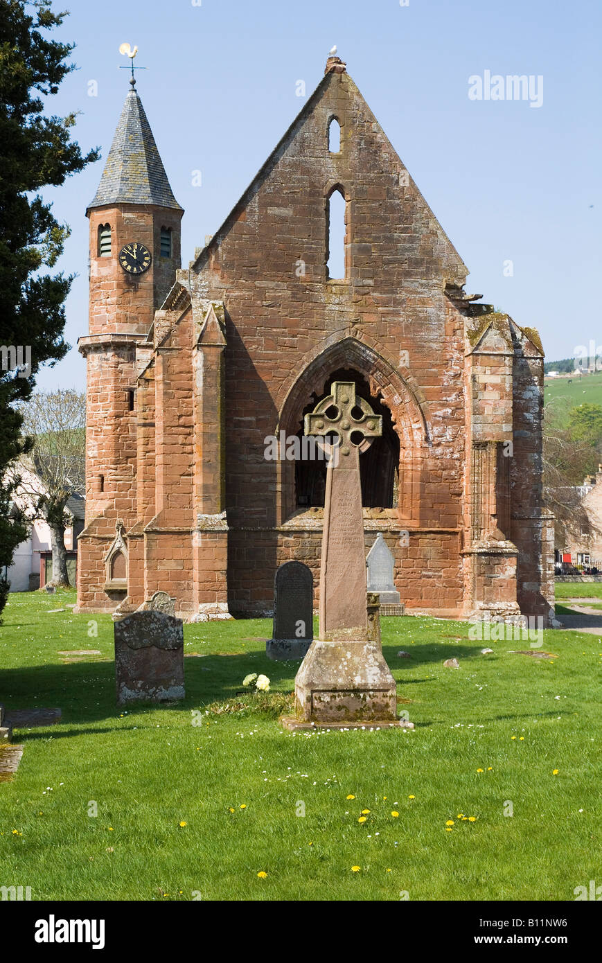dh Fortrose Cathedral FORTROSE ROSS CROMARTY Cathedral ruins and celtic cross gravestone scottish church ruined uk easter rossshire Stock Photo