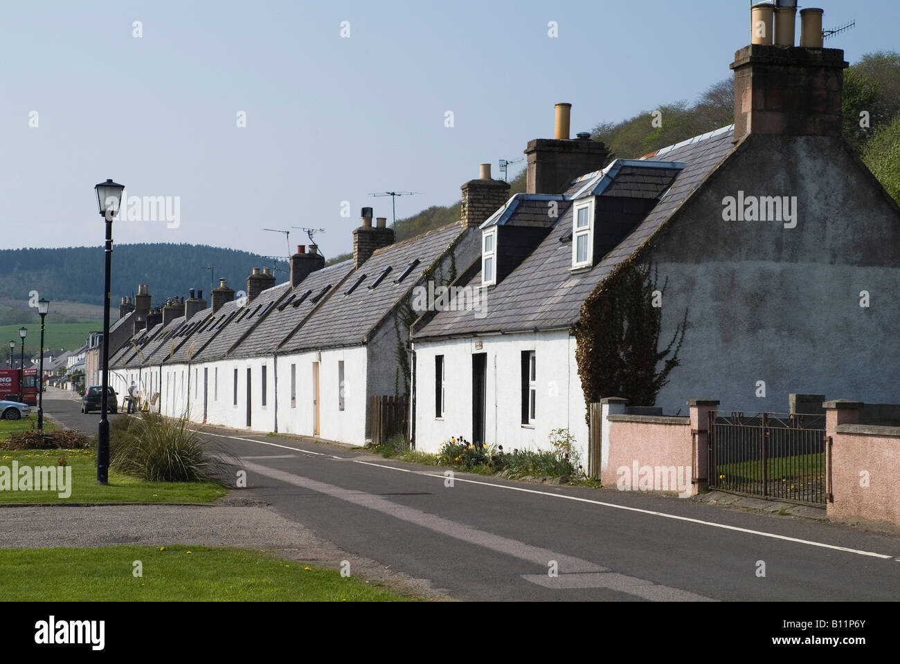 dh Fishing village cottages AVOCH BLACK ISLE ROSS CROMARTY Scottish cottage Houses seafront road scotland highlands street Stock Photo