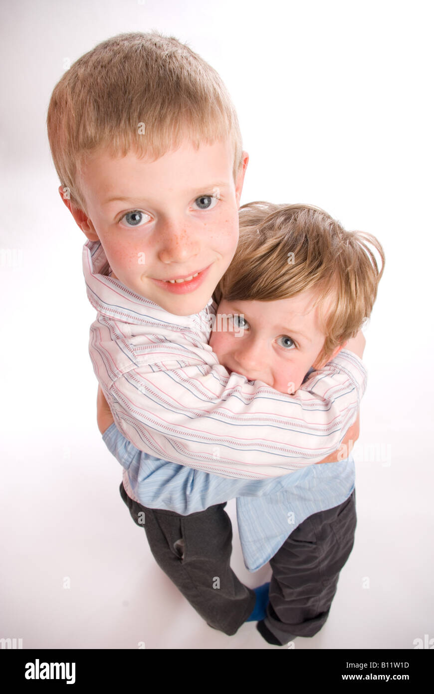 top down view of two boys cuddling Stock Photo - Alamy