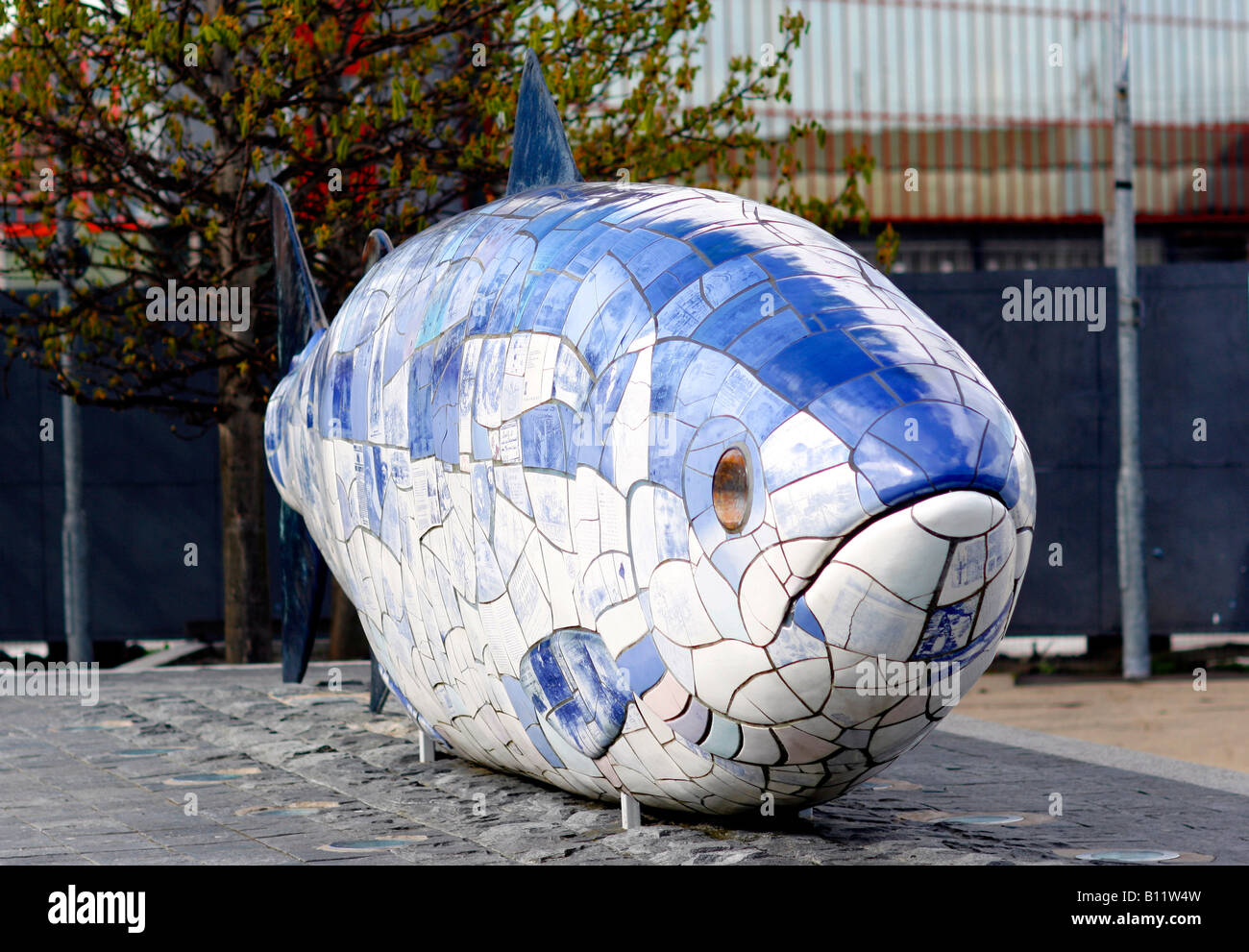 The Big Fish Sculpture, by artist John Kindness and stands on Donegall Quay in the docklands