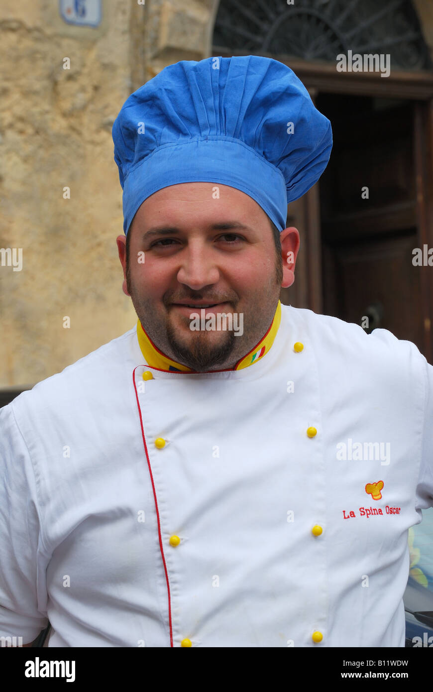 Male chef in uniform, Piazza Amerina, Citta di Enna, Enna Province, Sicily, Italy Stock Photo
