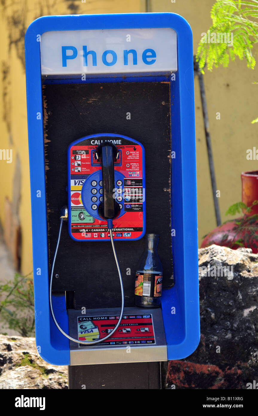 International telephone call box with discarded beer bottle, Tortola