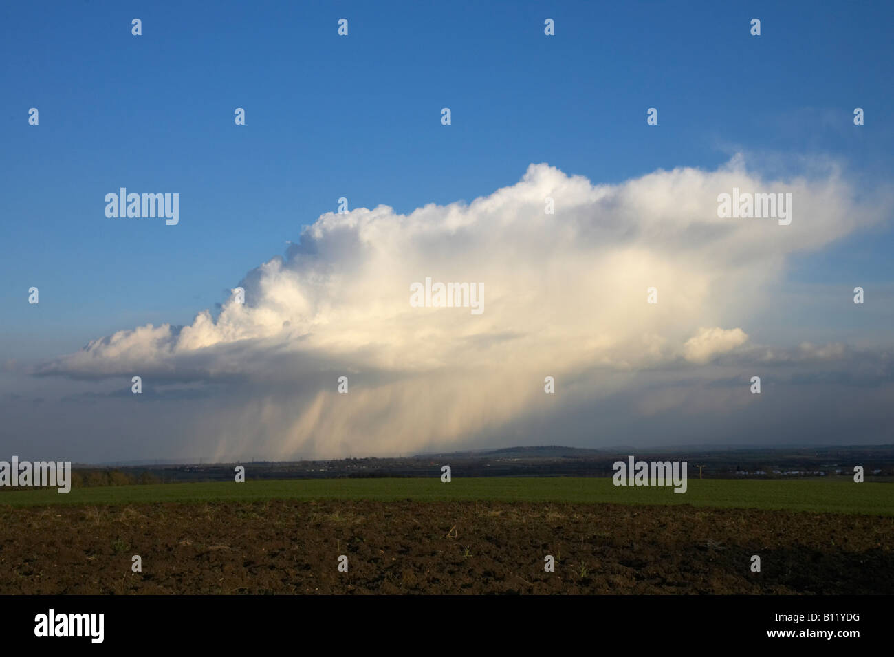 Snow shower over the English countryside Stock Photo Alamy