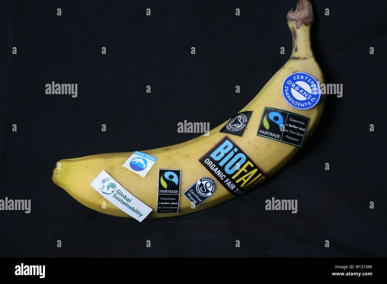 Banana with assorted stickers Stock Photo