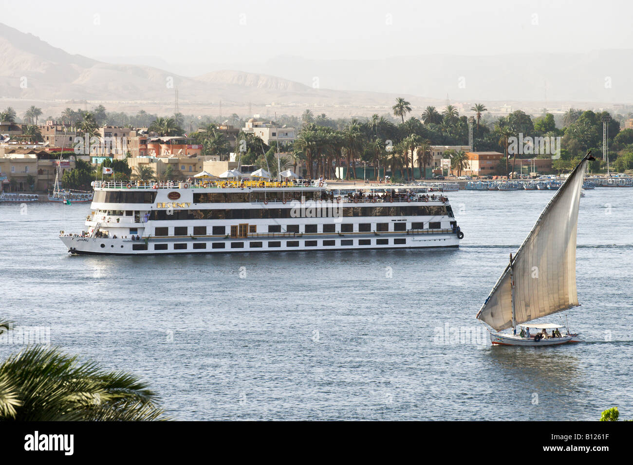 Cruise boat and Felucca on the River Nile looking towards the West Bank ...