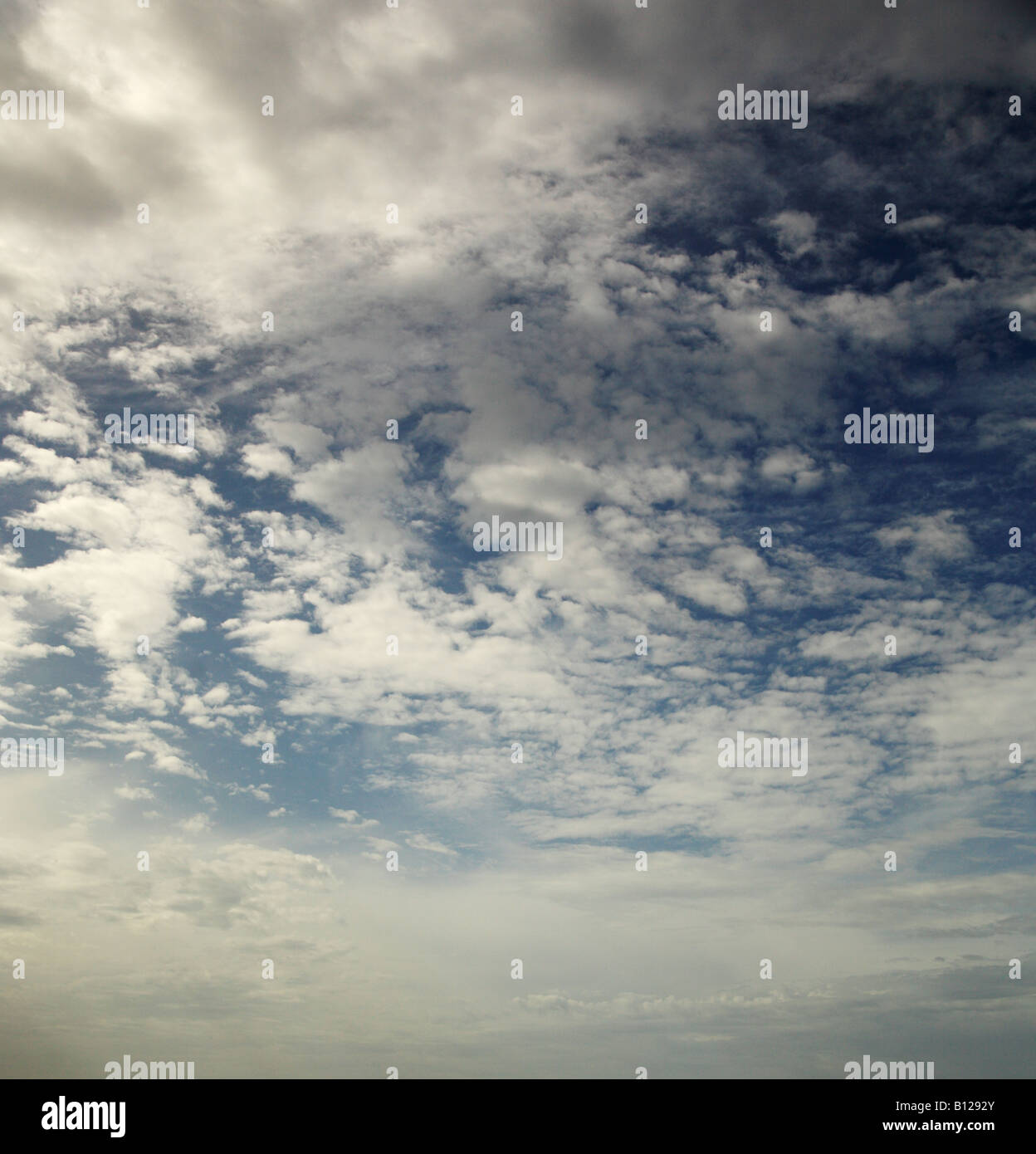 Fluffy clouds and blue sky Stock Photo - Alamy