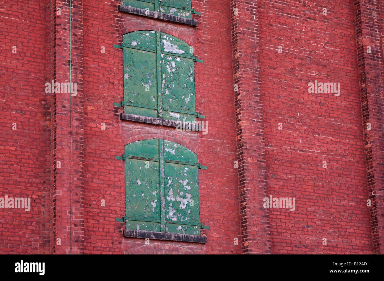 Colorful old industrial building wall Stock Photo