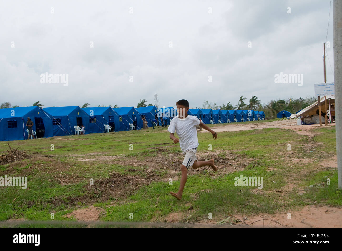 A relief encampment set up by the government for cyclone Nargis victims in Kyauktan township of Yangon Myanmar Burma Stock Photo