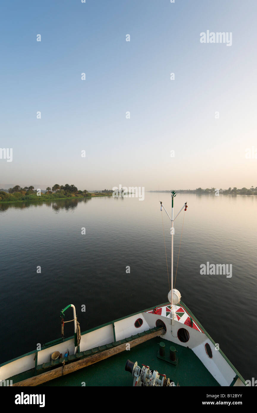 View at dawn from the deck of a River Nile Cruiser between Luxor and Quena, Nile Valley, Egypt Stock Photo
