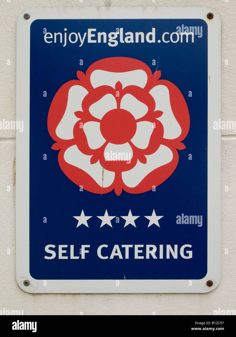 Sign showing self catering tourist accommodation is of 4 star quality and endorsed by enjoyengland.com Stock Photo