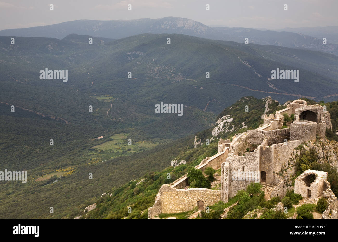 A mountainous landscape view from castle ruins in the French Pyrenees Languedoc Roussillon Southern France Stock Photo